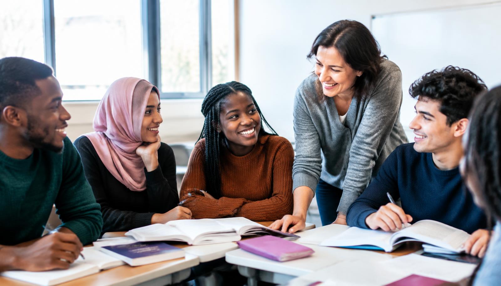 Diverse students learning with an educator